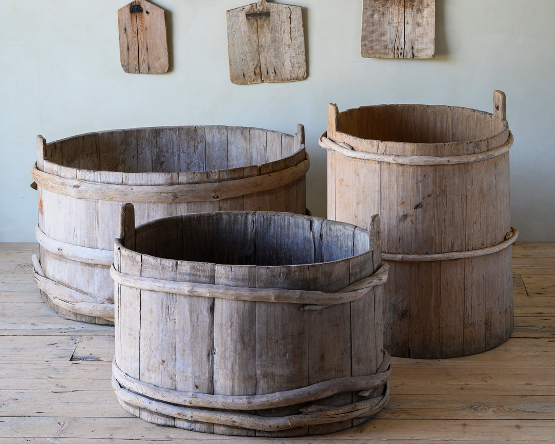 folk art wooden grain barrels