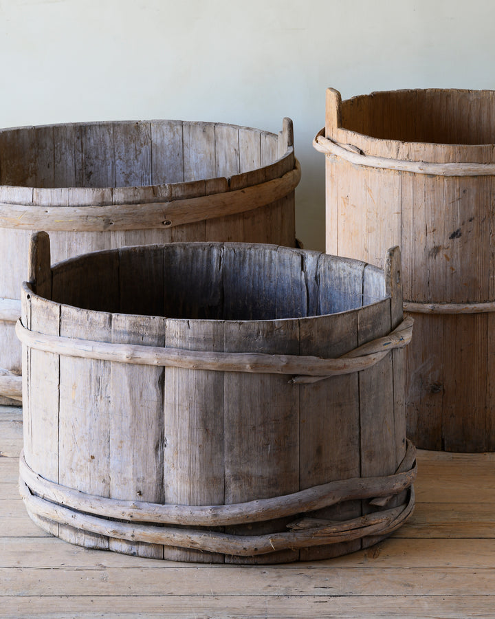 folk art wooden grain barrels